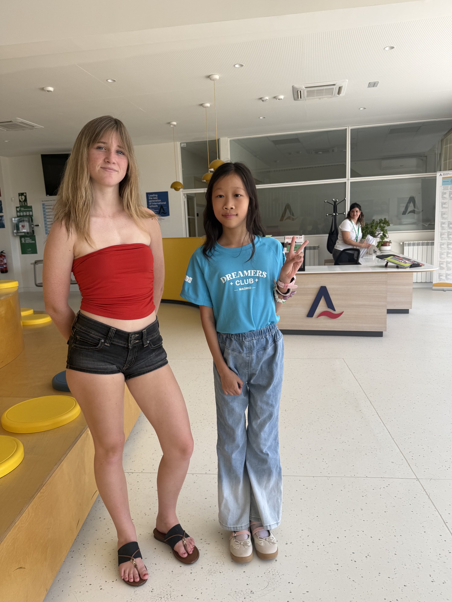 Two international Pen Pals meeting at school