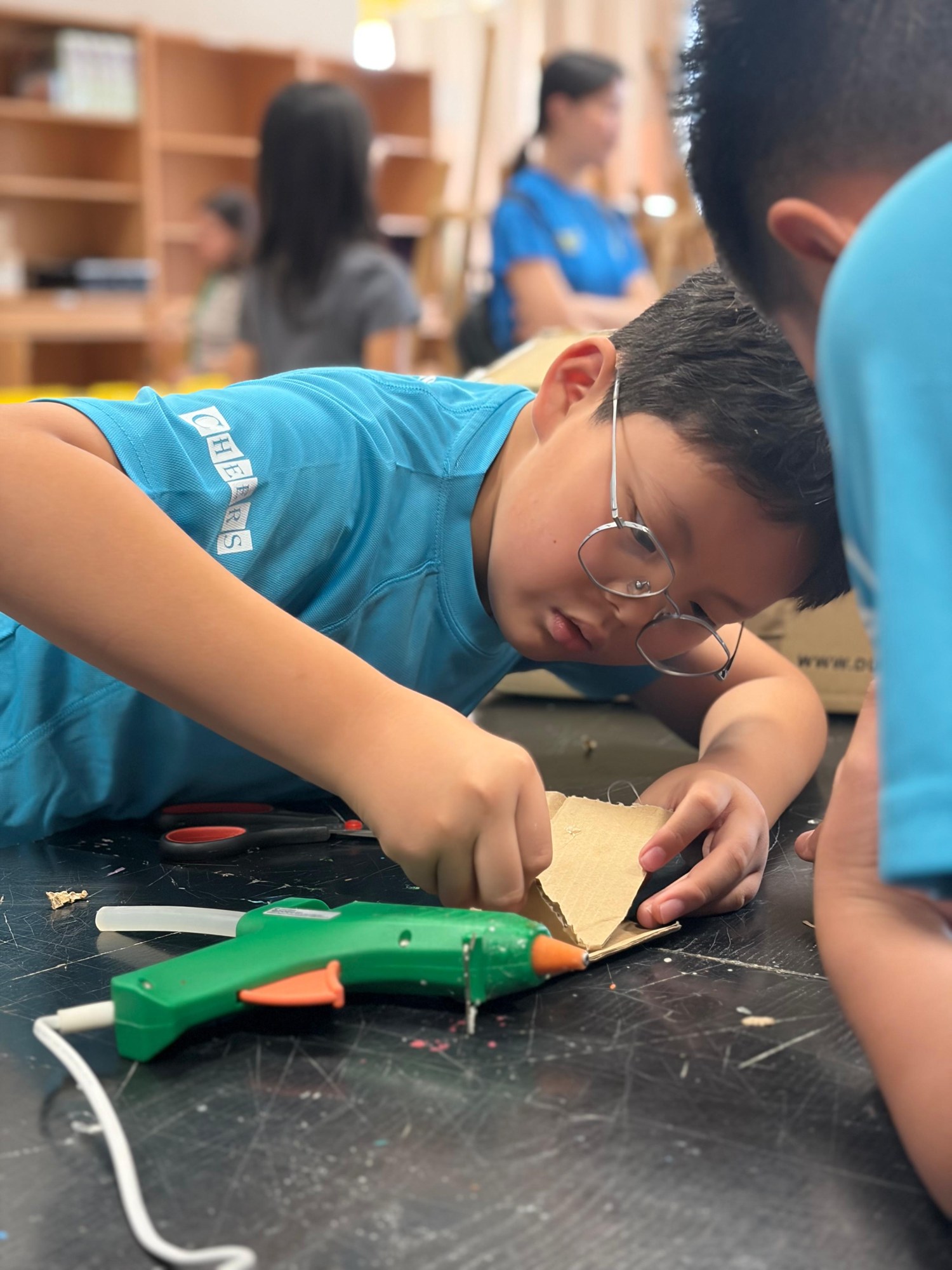 A Dreamer working on a hands-on classroom project
